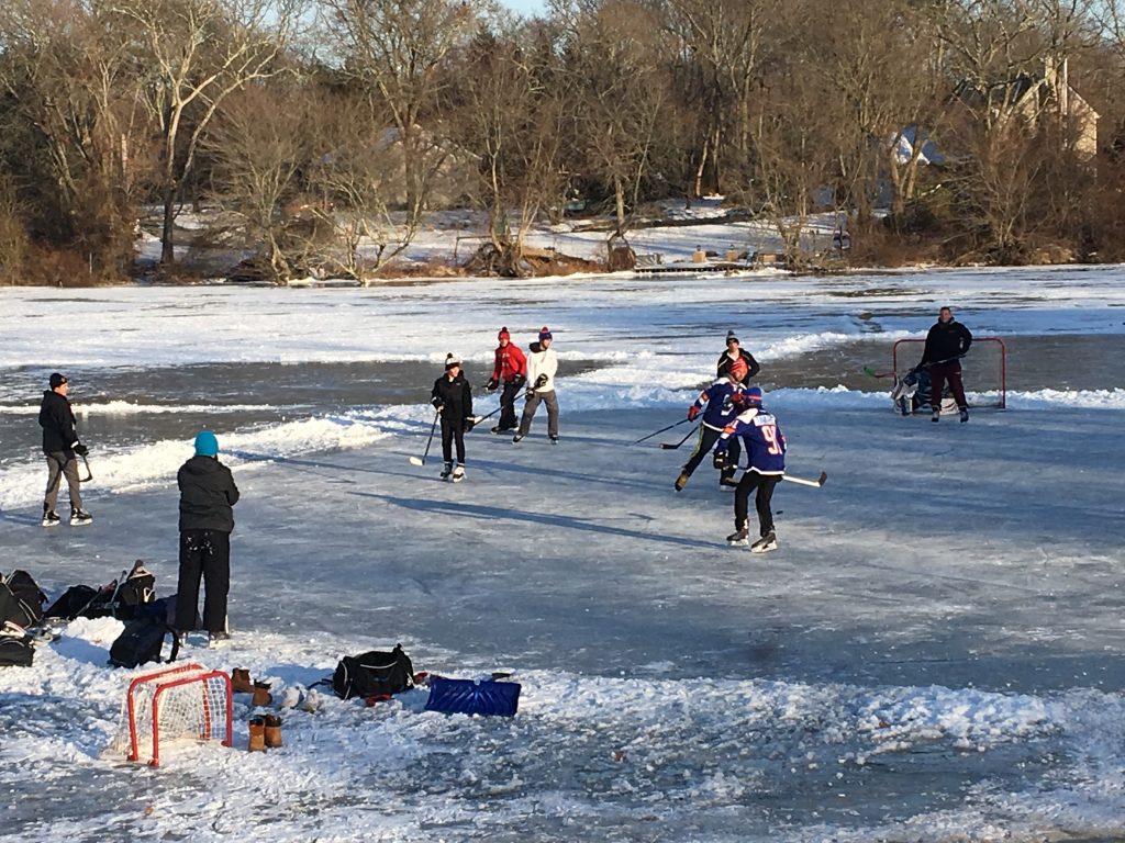 ice hockey players on Kaler's Pond